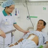 Sức khỏe của bệnh nhân Đặng Vĩ H. đã phục tốt sau ca phẫu thuật. (Ảnh: Trần Lê/Vietnam+)