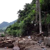 Hệ thống điện ở xã Nặm Păm, huyện Mường La bị hư hỏng nặng nề. (Ảnh: Nguyễn Cường/TTXVN)