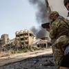 Binh sỹ Libya tham gia chiến dịch truy quét IS tại Sirte. (Nguồn: AFP/TTXVN)