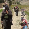 Các tay súng Taliban kiểm soát khu vực quận Ahmad Aba, ngoại ô Gardez, thủ phủ tỉnh Paktia, Afghanistan ngày 18/7. (Nguồn: AFP/TTXVN)