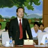 Bộ trưởng Bộ Xây dựng Phạm Hồng Hà trả lời chất vấn của các đại biểu. (Ảnh: Nguyễn Dân/TTXVN)