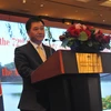 Tổng Lãnh sự Hoàng Chí Trung phát biểu tại buổi chiêu đãi. (Ảnh: Mỹ Anh/Vietnam+)