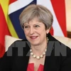 Thủ tướng Anh Theresa May tại một sự kiện ở London ngày 13/7. (Nguồn: AFP/TTXVN)