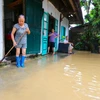 Nước dân cao gây ngập lụt tại tổ 25 phường Mường Thanh, thành phố Điện Biên Phủ. (Ảnh: Xuân Tư/TTXVN)