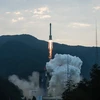 Tên lửa Trường Chinh-3B mang theo vệ tinh Bắc Đẩu rời bệ phóng. (Nguồn: THX/TTXVN)