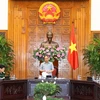 Thủ tướng Nguyễn Xuân Phúc chủ trì phiên họp Ban Chỉ đạo Nhà nước về xây dựng và phát triển công nghiệp quốc phòng, an ninh. (Ảnh: Thống Nhất/TTXVN)