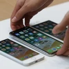3 mẫu điện thoại thông minh iPhone 8, iPhone 8 Plus và iPhone X. (Nguồn: AFP/TTXVN)