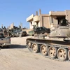 Lực lượng quân đội Syria trong chiến dịch truy quét IS ở Bughayliyah, ngoại ô Deir Ezzor ngày 13/9. (Nguồn: AFP/TTXVN)