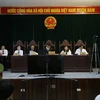 Hội đồng xét xử. (Ảnh: Nguyễn Cúc/Vietnam+)