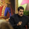 Tổng thống Venezuela Nicolas Maduro phát biểu trong cuộc họp báo ở Caracas. (Nguồn: EPA/TTXVN)