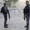 Cảnh sát Israel gác tại Thành cổ Jerusalem sau khi các máy dò kim loại được dỡ bỏ ngày 26/7. (Nguồn: EPA/TTXVN)