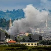 Khói bốc lên trong cuộc giao tranh giữa quân đội Philippines và phiến quân tại Marawi ngày 16/9. (Nguồn: AFP/TTXVN)