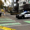 Cảnh sát Canada điều tra tại hiện vụ tấn công ở Edmonton ngày 1/10. (Nguồn: The SUN/ TTXVN)