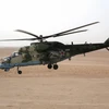 Trực thăng Mi-24 của Nga tham gia hỗ trợ cuộc chiến chống IS của quân đội Syria tại khu vực Deir Ezzor, Syria ngày 15/9. (Nguồn: AFP/TTXVN)