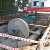 Máy bơm ly tâm được đặt thí điểm tại điểm ngập trên đường Nguyễn Hữu Cảnh. (Ảnh: Hoàng Hải/TTXVN)