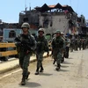 Binh sỹ Philippines tuần tra tại thành phố Marawi ngày 30/8. (Nguồn: EPA/TTXVN)