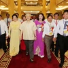 Tổng Bí thư Nguyễn Phú Trọng với các đại biểu nông dân xuất sắc. (Ảnh: Trí Dũng/TTXVN)