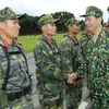 Chủ tịch nước Trần Đại Quang làm việc với Bộ Quốc phòng tại Trung tâm Huấn luyện Miếu Môn, Hà Nội. (Ảnh: Nhan Sáng/TTXVN)
