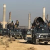 Các lực lượng Chính phủ Iraq tiến vào thành phố Kirkuk sau khi giành lại quyền kiểm soát thành phố này từ lực lượng người Kurd ngày 16/10. (Nguồn: AFP/TTXVN)
