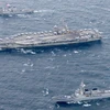 Tàu sân bay USS Ronald Reagan của Mỹ tham gia cuộc tập trận chung với quân đội Hàn Quốc tại khu vực cảng Busan, Hàn Quốc ngày 21/10. (Nguồn: Yonhap/TTXVN)