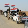 Các lực lượng Iraq tiến vào khu vực Anna, tỉnh Anbar trong chiến dịch chống IS ngày 19/9. (Nguồn: AFP/TTXVN)