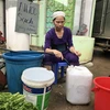 Một điểm bán nước sinh hoạt của người dân thành phố Sơn La. (Ảnh: Hữu Quyết/TTXVN)