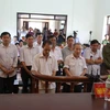 Các bị cáo trong phiên xét xử ngày 8/8. (Ảnh: Nguyễn Văn Cảnh/TTXVN)