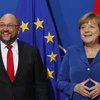 Thủ tướng Đức Angela Merkel (phải) và Lãnh đạo đảng SPD Martin Schulz trong cuộc gặp tại Hạ viện Đức. (Nguồn: EPA/TTXVN)