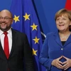 Thủ tướng Đức Angela Merkel (phải) và Lãnh đạo đảng SPD Martin Schulz trong cuộc gặp tại Hạ viện Đức. (Nguồn: EPA/TTXVN)