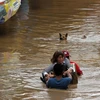 [Photo] Bão Tembin tàn phá, gây ngập lụt khắp nơi tại Philippines