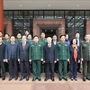 Tổng Bí thư Nguyễn Phú Trọng, Bí thư Quân ủy Trung ương và các đại biểu dự Hội nghị chụp ảnh chung. (Ảnh: Trí Dũng/TTXVN)