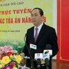 Chủ tịch nước Trần Đại Quang, Trưởng Ban Chỉ đạo cải cách Tư pháp Trung ương đến dự và phát biểu chỉ đạo Hội nghị tổng kết năm 2017 và triển khai công tác năm 2018 của ngành Tòa án. (Ảnh: Nhan Sáng/TTXVN)