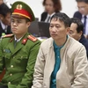 Bị cáo Trịnh Xuân Thanh và đồng phạm tại phiên tòa. (Ảnh: Doãn Tấn/TTXVN)