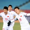 Niềm vui của các cầu thủ U23 Việt Nam sau khi san bằng tỉ số 2-2. (Ảnh: Hoàng Linh/TTXVN)