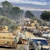 Xe quân sự Thổ Nhĩ Kỳ kiểm soát đồi Barsaya. (Nguồn: AP/TTXVN)