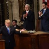 Tổng thống Mỹ Donald Trump (trái) đọc Thông điệp liên bang năm 2018 tại Washington DC., ngày 30/1. (Nguồn: THX/TTXVN)