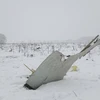 Mảnh vỡ của chiếc máy bay An-148 được tìm thấy tại khu vực Ramenskoye sau vụ tai nạn. (Nguồn: The Telegraph News/TTXVN)