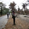 Cảnh sát gác tại thị trấn Maungdaw, bang Rakhine, Myanmar ngày 31/8/2017. (Nguồn: AFP/TTXVN)