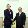Thủ tướng Nguyễn Xuân Phúc tiếp ông Hwang Kag-gyu, Phó Chủ tịch Tập đoàn Lotte (Hàn Quốc). (Ảnh: Thống Nhất/TTXVN)