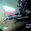 Cánh tay robot của tàu lặn siêu nhỏ Mir-1 cắm cờ Liên bang Nga ở đáy Bắc cực, dưới độ sâu 4261m, ngày 3/8/2007. (Nguồn: AFP/ TTXVN)