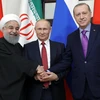 Tổng thống Iran Hassan Rouhani, Tổng thống Nga Vladimir Putin và Tổng thống Thổ Nhĩ Kỳ Tayyip Erdogan tại hội nghị thượng đỉnh ba bên về vấn đề Syria ở Sochi, Nga ngày 22/11/2017. (Nguồn: AFP/TTXVN)