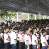 Học sinh huyện Củ Chi viếng nguyên Thủ tướng Phan Văn Khải. (Ảnh: Hoàng Hải/TTXVN)