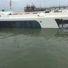 Hiện trường chiếc tàu cao tốc bị chìm ở bến Tắc Suất, huyện Cần Giờ. (Ảnh: Linh Sơn/TTXVN)