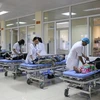 Các bệnh nhân đang được điều trị tích cực tại bệnh viện Việt Nam-Thụy Điển. (Ảnh: Trung Nguyên/TTXVN)