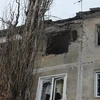 Nhà cửa tan hoang do xung đột kéo dài ở Donetsk, miền Đông Ukraine. (Nguồn: Sputnik)
