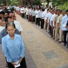 Người dân Campuchia xếp hàng chờ bỏ phiếu trong cuộc bầu cử Thượng viện tại một điểm bầu cử ở tỉnh Kandal ngày 25/2. (Nguồn: THX/TTXVN)