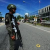 Binh sỹ Thái Lan gác tại hiện trường một vụ tấn công ở tỉnh Narathiwat. (Nguồn: AFP/TTXVN)