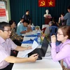 Doanh nghiệp tuyển dụng lao động có tay nghề tại sàn giao dịch việc làm Tp. Hồ Chí Minh. (Ảnh: Thanh Vũ/TTXVN)