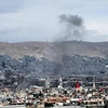 Khói bốc lên tại hiện trường một vụ tấn công bằng tên lửa ở Damascus của Syria ngày 9/5. (Ảnh: THX/TTXVN)