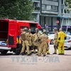 Lực lượng chức năng làm nhiệm vụ tại hiện trường vụ xả súng ở Liege, Bỉ ngày 29/5. (Nguồn: EPA-EFE/TTXVN)